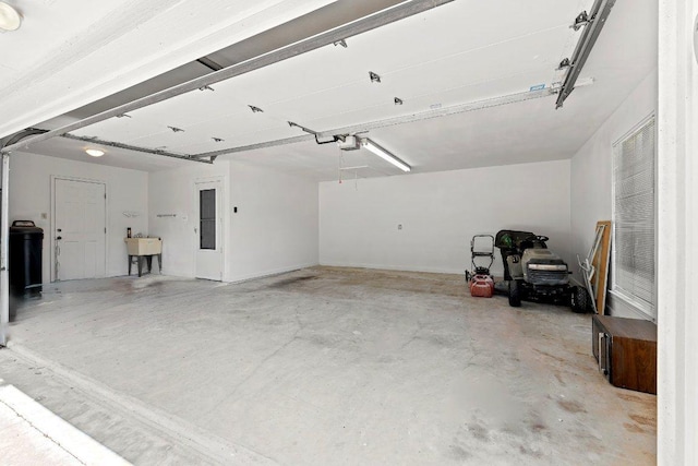 302 Council Rd, Georgetown, TX 78633 - garage with a garage door opener and a sink