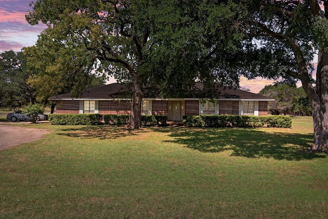 302 Council Rd, Georgetown, TX 78633 - single story home featuring a front yard and brick siding