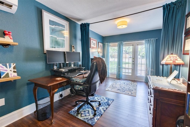 1433 Jenna Ln, Cedar Park, TX 78613 - office with french doors, wood finished floors, an AC wall unit, a textured wall, and baseboards