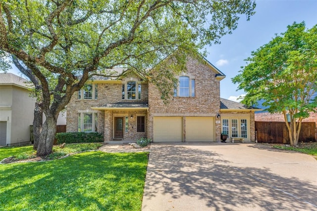 1433 Jenna Ln, Cedar Park, TX 78613 - traditional-style house featuring concrete driveway, an attached garage, and brick siding