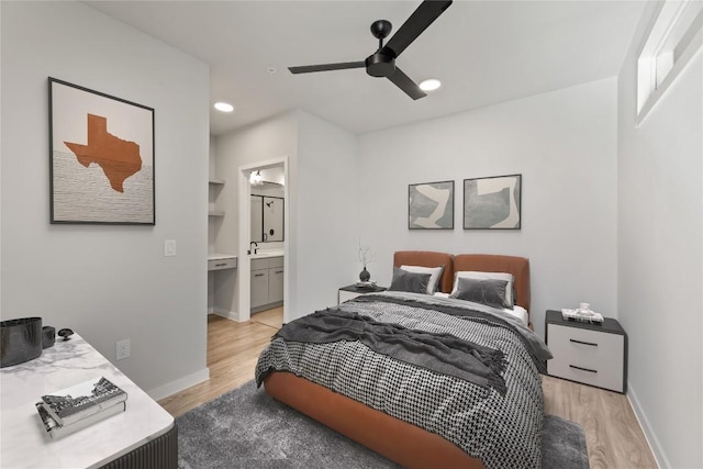 4510 Terryo Ln Unit 139, Austin, TX 78745 - bedroom with light wood-style floors, baseboards, recessed lighting, connected bathroom, and a ceiling fan