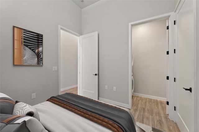 4510 Terryo Ln Unit 139, Austin, TX 78745 - bedroom with light wood-style floors and baseboards