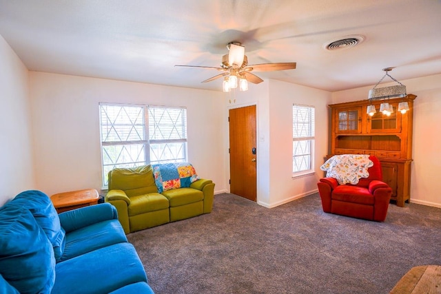 2607 Monticello Ct, San Antonio, TX 78223 - living room with a ceiling fan and carpet flooring