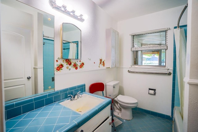 2607 Monticello Ct, San Antonio, TX 78223 - full bathroom with vanity, tile patterned flooring, and shower / tub combo with curtain
