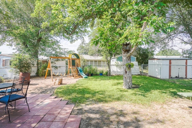 2607 Monticello Ct, San Antonio, TX 78223 - fenced backyard featuring a playground