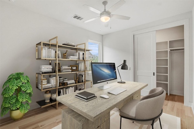 4127 E 12th St Unit 6, Austin, TX 78721 - office space featuring light wood-style flooring and a ceiling fan