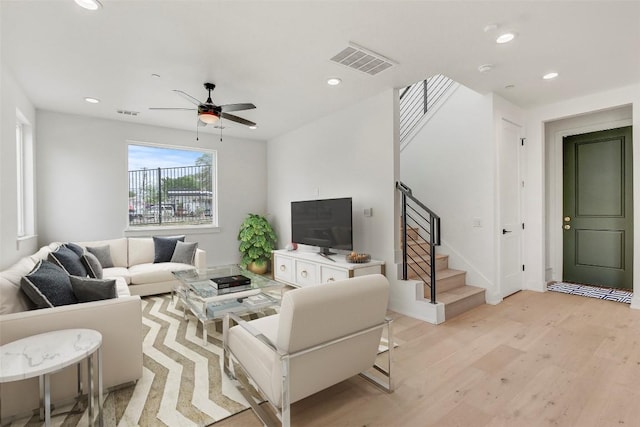 4127 E 12th St Unit 6, Austin, TX 78721 - living area with light wood-style flooring, stairway, recessed lighting, and ceiling fan