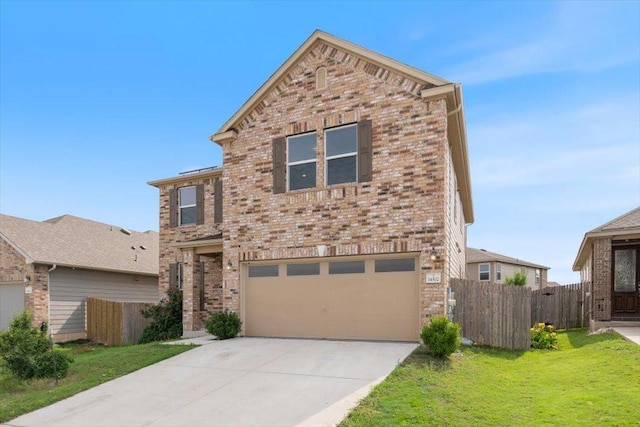 14302 Honey Gem Dr, Pflugerville, TX 78660 - traditional home featuring a garage, concrete driveway, and brick siding