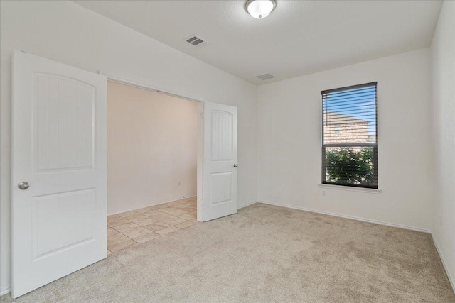 14302 Honey Gem Dr, Pflugerville, TX 78660 - unfurnished bedroom with light colored carpet and baseboards