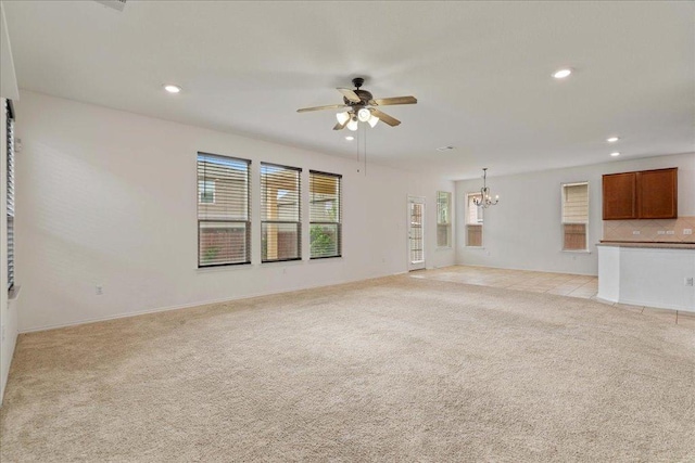 14302 Honey Gem Dr, Pflugerville, TX 78660 - unfurnished living room with a chandelier, light carpet, ceiling fan, and recessed lighting