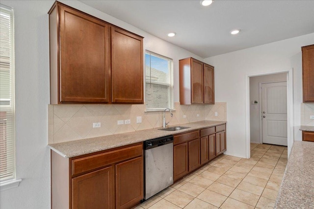 14302 Honey Gem Dr, Pflugerville, TX 78660 - kitchen featuring dishwasher, a sink, tasteful backsplash, light countertops, and recessed lighting