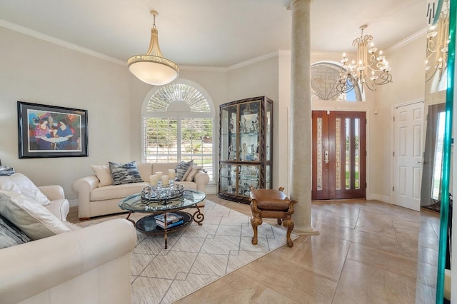 20503 Hoover Cv, Lago Vista, TX 78645 - living area with crown molding, a chandelier, and ornate columns