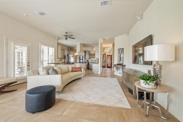 20503 Hoover Cv, Lago Vista, TX 78645 - living room featuring a ceiling fan, light tile patterned flooring, baseboards, and recessed lighting