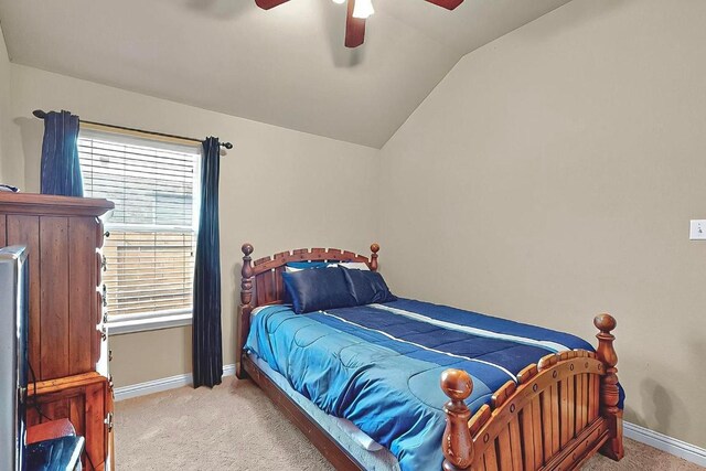 320 Atlanta Park Dr, Georgetown, TX 78628 - bedroom featuring light carpet, lofted ceiling, baseboards, and ceiling fan
