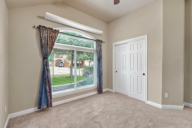 320 Atlanta Park Dr, Georgetown, TX 78628 - unfurnished bedroom with carpet floors, baseboards, vaulted ceiling, and a closet