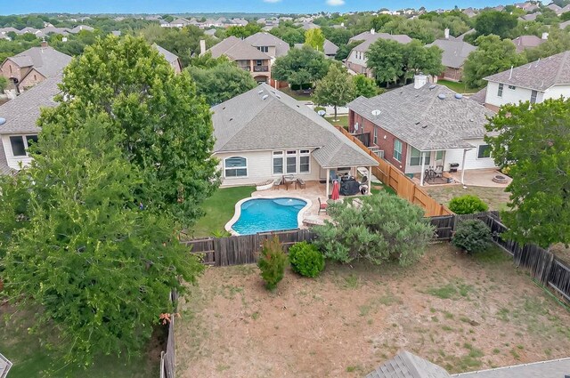 320 Atlanta Park Dr, Georgetown, TX 78628 - view of swimming pool with a residential view, a fenced backyard, and a patio