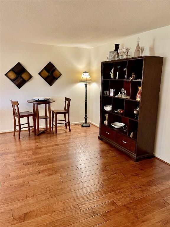4107 Columbine Dr, Austin, TX 78727 - living area with hardwood / wood-style flooring and baseboards