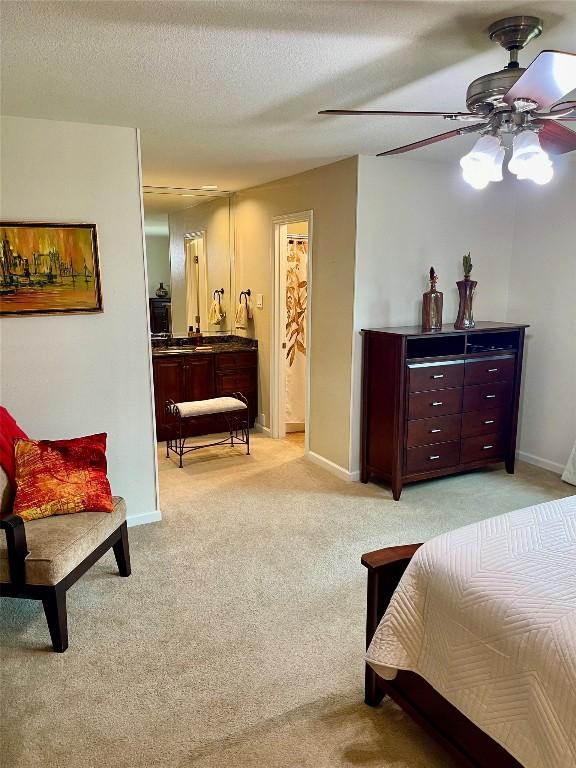 4107 Columbine Dr, Austin, TX 78727 - bedroom featuring light colored carpet, baseboards, and ceiling fan