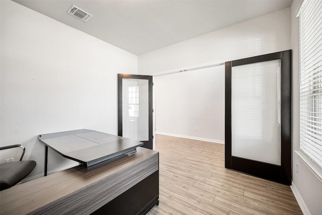 265 Fawn River Run, Kyle, TX 78640 - bedroom with light wood-style floors and baseboards