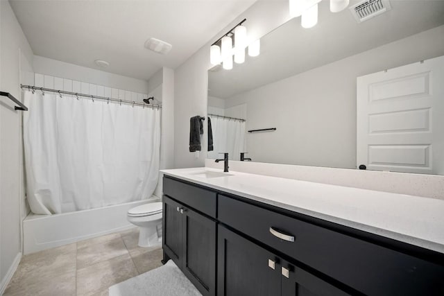 265 Fawn River Run, Kyle, TX 78640 - full bath featuring vanity, toilet, shower / bath combo, and tile patterned floors