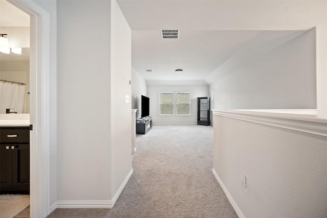 265 Fawn River Run, Kyle, TX 78640 - corridor with carpet flooring and baseboards