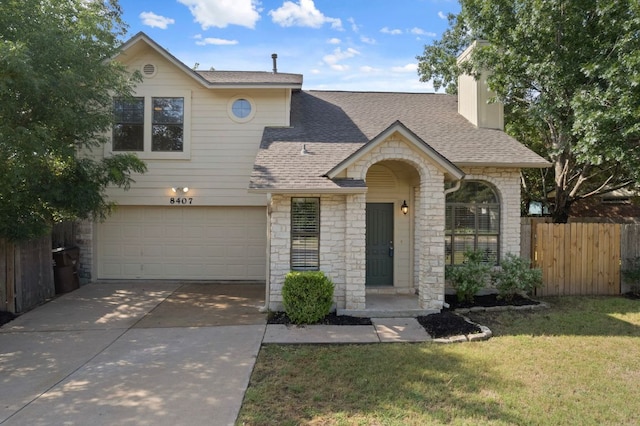 8407 Mount Shasta Cv, Round Rock, TX 78681 - view of front of house with roof with shingles, concrete driveway, a garage, stone siding, and a chimney