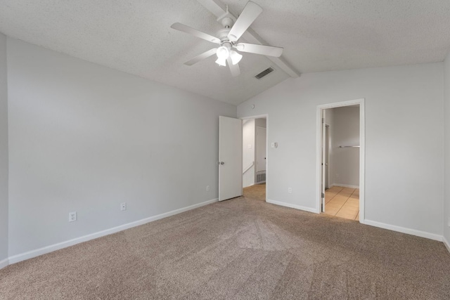 8407 Mount Shasta Cv, Round Rock, TX 78681 - unfurnished bedroom with light carpet, a textured ceiling, baseboards, ensuite bath, and ceiling fan