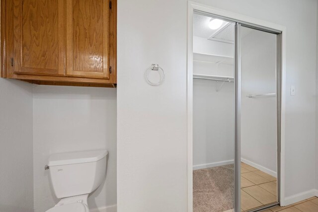 8407 Mount Shasta Cv, Round Rock, TX 78681 - bathroom with toilet, tile patterned flooring, and baseboards