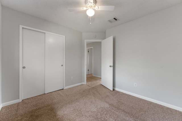 8407 Mount Shasta Cv, Round Rock, TX 78681 - unfurnished bedroom featuring carpet, baseboards, a closet, and ceiling fan