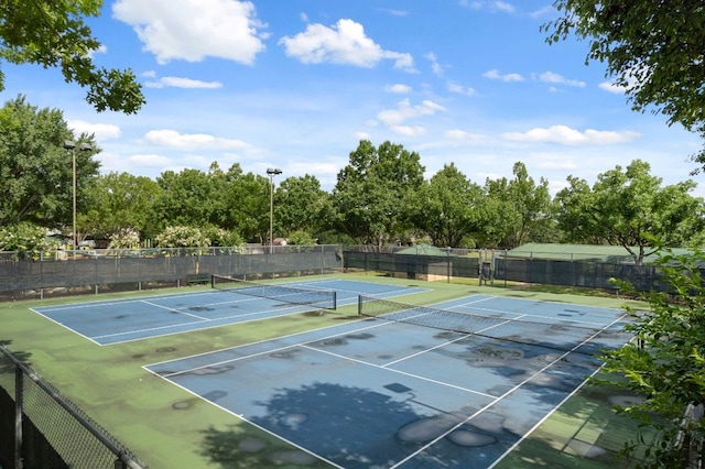 8407 Mount Shasta Cv, Round Rock, TX 78681 - view of tennis court featuring community basketball court