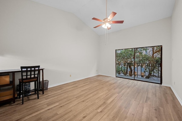 1908 San Antonio St Unit 313, Austin, TX 78705 - spare room featuring high vaulted ceiling, wood finished floors, ceiling fan, and baseboards