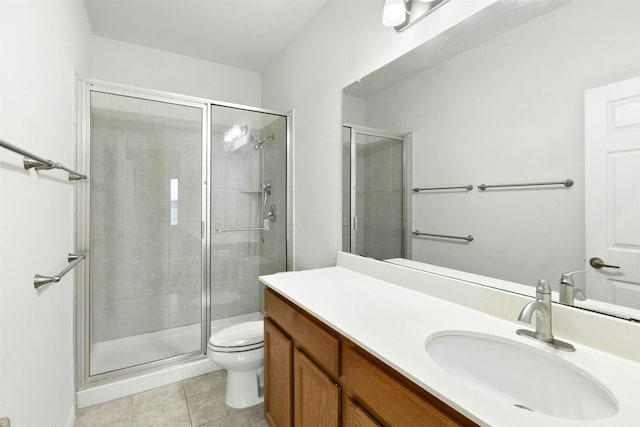13208 Olivers Way, Manchaca, TX 78652 - full bathroom with toilet, vanity, a shower stall, and tile patterned floors
