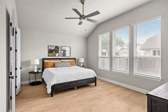 286 Canal Dr, Dripping Springs, TX 78620 - bedroom featuring lofted ceiling, light wood-style flooring, baseboards, and a ceiling fan