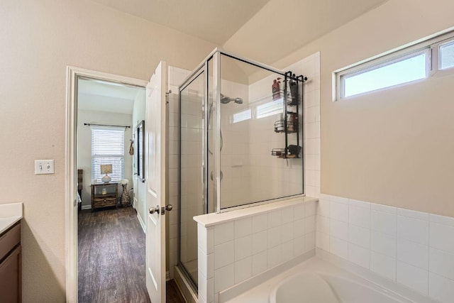 814 Hatton Hill Ct, Austin, TX 78725 - ensuite bathroom featuring a shower stall, a garden tub, plenty of natural light, and vanity