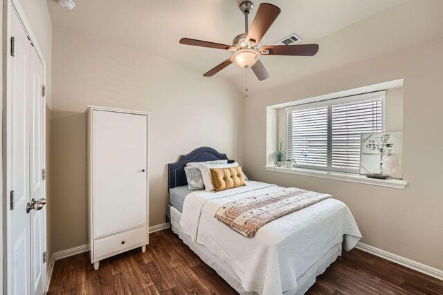 814 Hatton Hill Ct, Austin, TX 78725 - bedroom with baseboards, wood finished floors, and a ceiling fan