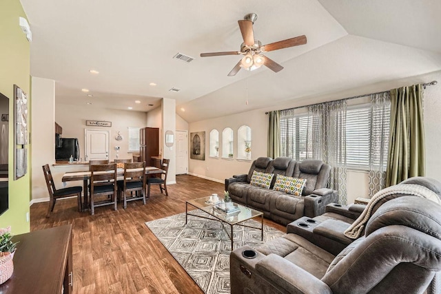 814 Hatton Hill Ct, Austin, TX 78725 - living area featuring vaulted ceiling, ceiling fan, baseboards, wood finished floors, and recessed lighting