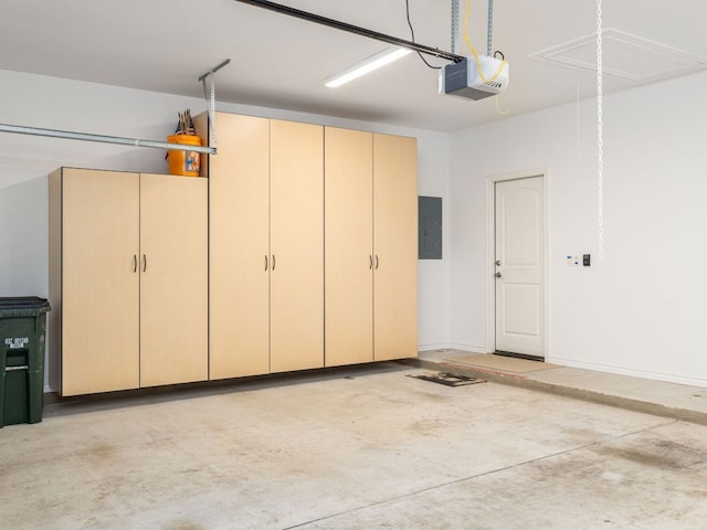 4914 Big Bend Trl, Georgetown, TX 78633 - garage featuring a garage door opener and electric panel