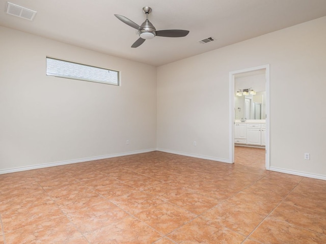 4914 Big Bend Trl, Georgetown, TX 78633 - spare room featuring a ceiling fan, baseboards, and light tile patterned floors