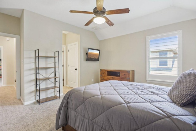 2513 Rusty Spur, Leander, TX 78641 - bedroom featuring light colored carpet, vaulted ceiling, baseboards, and ceiling fan