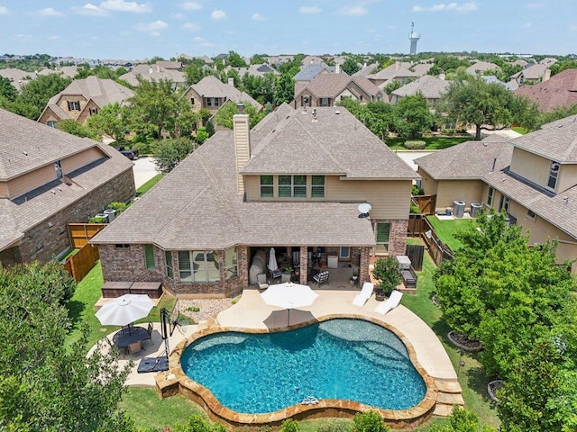 2513 Rusty Spur, Leander, TX 78641 - swimming pool with a residential view, a patio, a gazebo, and a fenced backyard