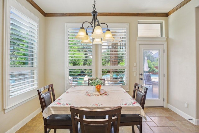 2513 Rusty Spur, Leander, TX 78641 - dining space featuring a chandelier, baseboards, ornamental molding, and stone tile floors