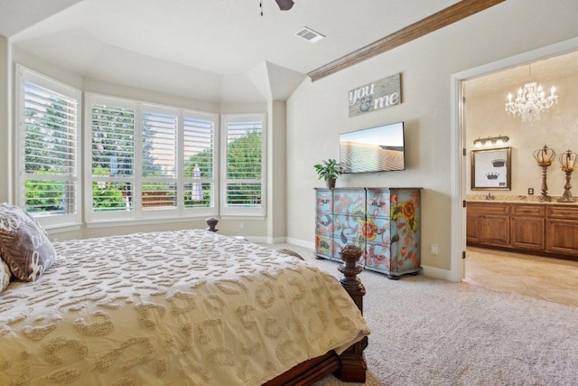 2513 Rusty Spur, Leander, TX 78641 - bedroom with multiple windows, baseboards, a chandelier, and connected bathroom