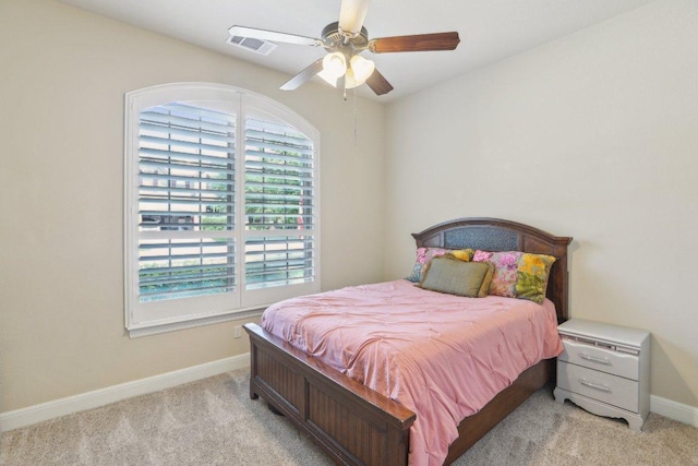 2513 Rusty Spur, Leander, TX 78641 - bedroom with baseboards, light colored carpet, and a ceiling fan
