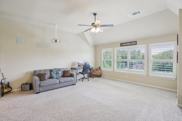 2513 Rusty Spur, Leander, TX 78641 - carpeted living room with vaulted ceiling, ceiling fan, and baseboards