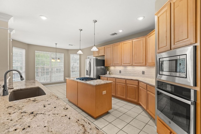 10617 Bramblecrest Dr, Austin, TX 78726 - kitchen featuring a sink, appliances with stainless steel finishes, light brown cabinets, backsplash, and recessed lighting