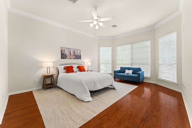 10617 Bramblecrest Dr, Austin, TX 78726 - bedroom with wood finished floors, baseboards, crown molding, and multiple windows