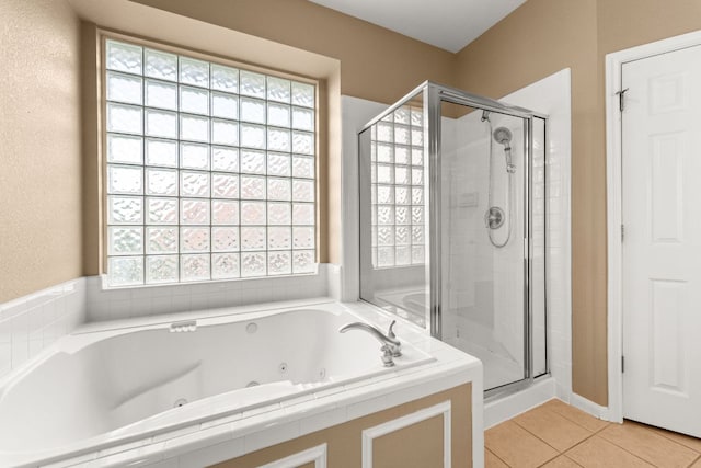 10617 Bramblecrest Dr, Austin, TX 78726 - bathroom with a stall shower, a whirlpool tub, and tile patterned floors