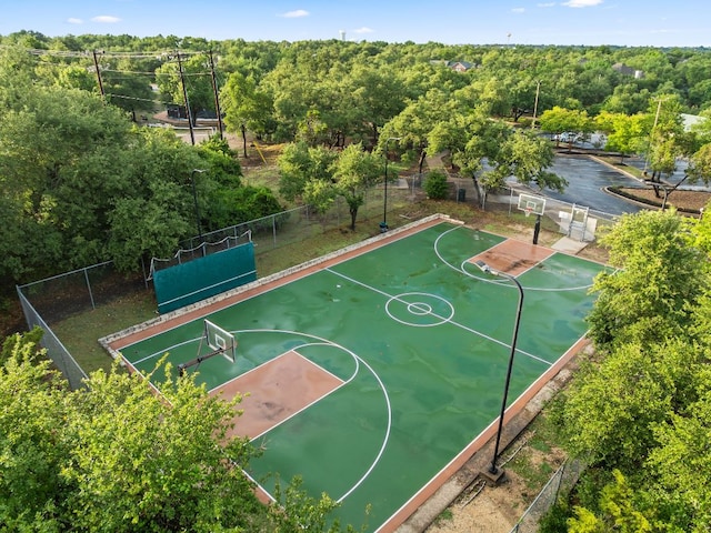10617 Bramblecrest Dr, Austin, TX 78726 - view of basketball court with community basketball court and a wooded view