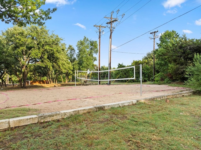 10617 Bramblecrest Dr, Austin, TX 78726 - view of community featuring volleyball court and a yard