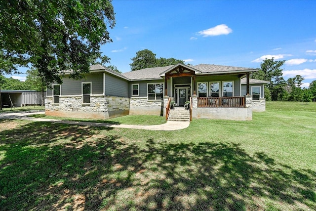 141 N Buckhorn Dr, Bastrop, TX 78602 - view of front of home featuring stone siding and a front yard